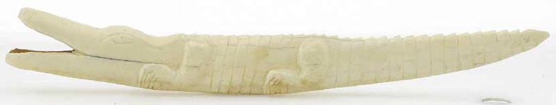 Crocodile, graved from old ivory ...